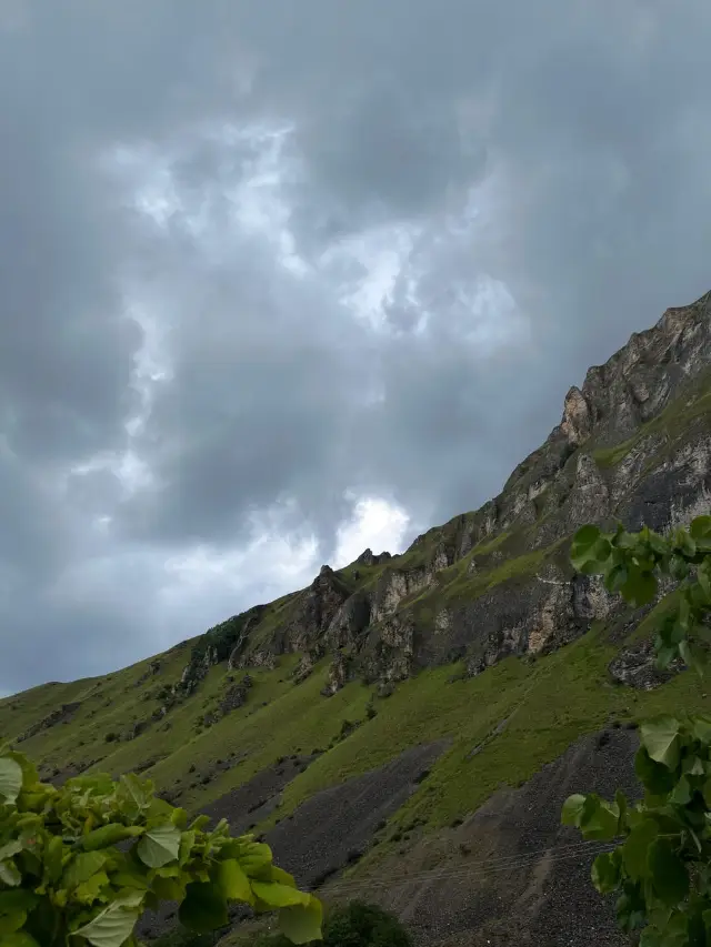 Green slopes and cliffs in the Sharr Mountains near Dragash